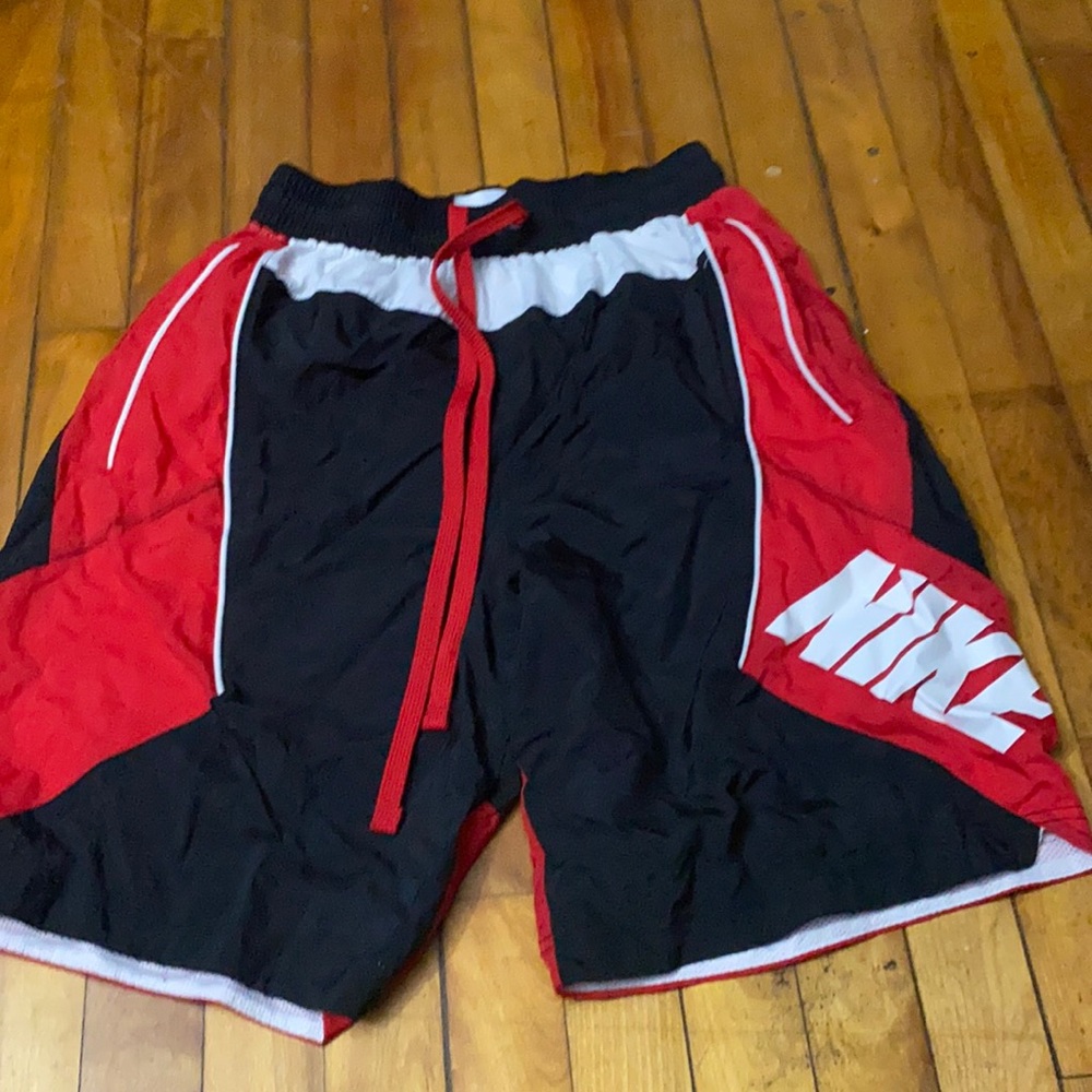 Nike wind shorts. Can also be worn as swin shorts